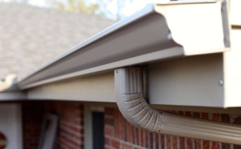 Close-up of new gutter installation